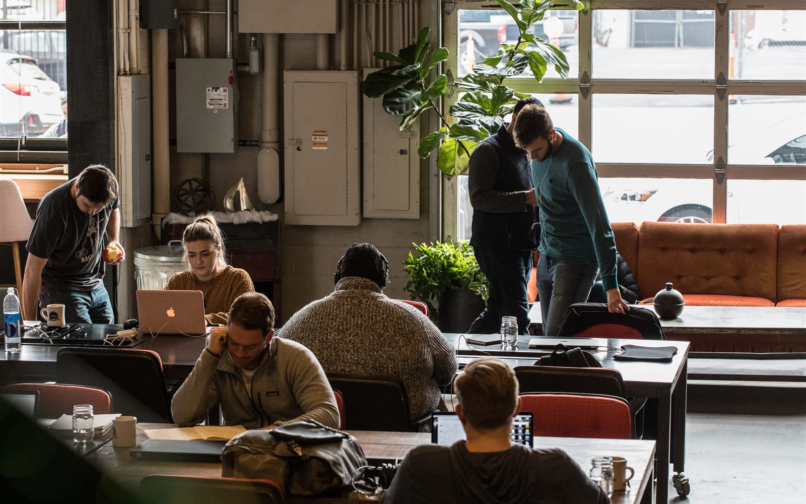 Team collaborating around a table in a modern office