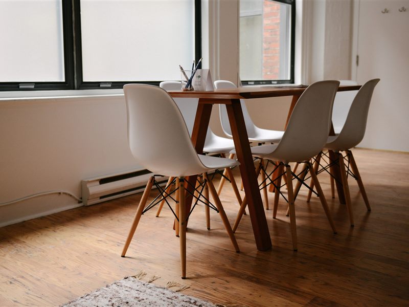 Private office interior with glass walls and city view